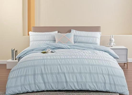 Ensemble de housse de couette en coton seersucker et polyester recyclé durable, bleu clair, pour lit King