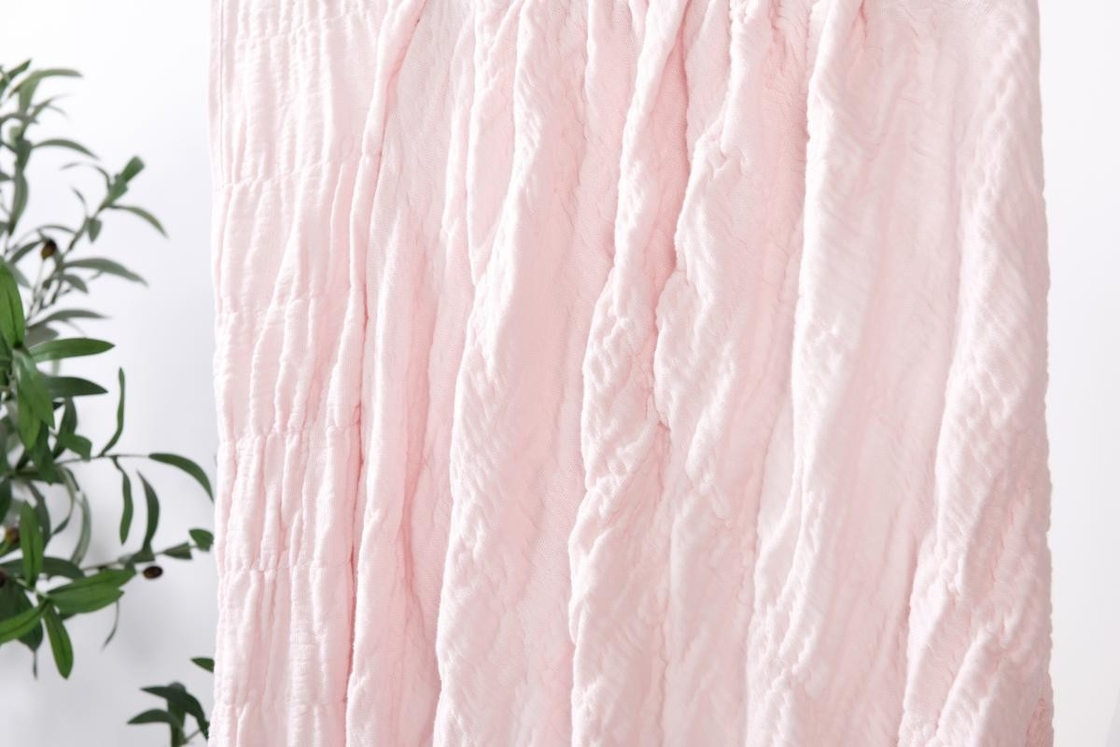 Une couverture en coton 100% couverture rose couverture de lit taille roi chic et confortable
